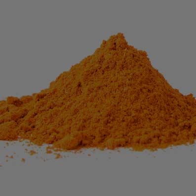 Pharmatechlabs® | Dry Mixing or Dry powder blending of a Orange powder sitting on a white counter.
